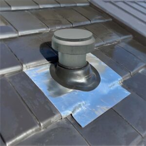 alpint_ventilation-compact_roof_vent-galvanised-tiled-roof_insitu-2
